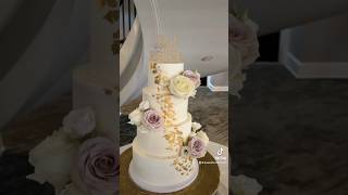 Adding Florals to Wedding Cake #cakevideo #dmv #weddingcake #flowers