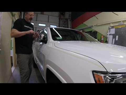 Straight line pinstriping on a Jeep Grand Cherokee