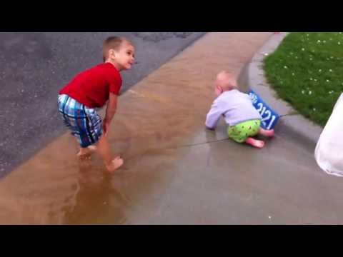 Lily playing in the rain 5-19-13
