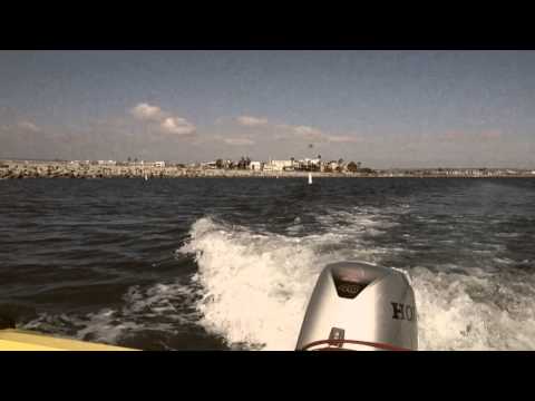 Tyler Anderson driving speed boat in Marina del Rey, California