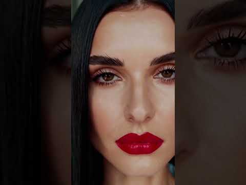 💋✨【Timeless Beauty】Sleek jet-black hair, flawless skin in natural daylight, and a bold red lip