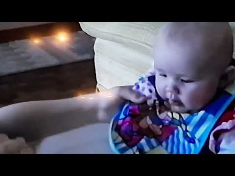 Home Movies from the 90's: Chris Feeds Bria