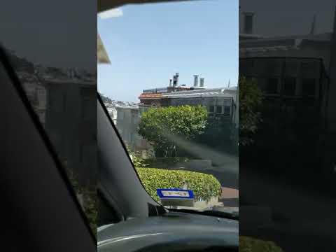 Driving down "the crookedest street" in California (Lombard St)