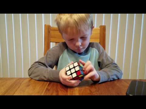 Mason Solving a Rubik's Cube