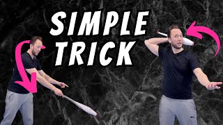 Simple juggling trick with clubs (but looks really good)