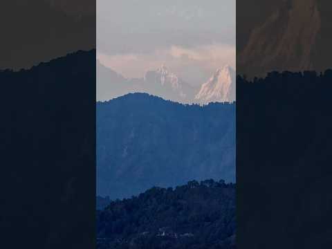 "Where the earth touches the sky — . 🏔✨ #NatureLovers #MountainMagic #ytshorts #shorts  # youtube