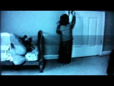 Little boy learns to work the doorknob