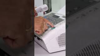 hand man are using a fax machine in the office, equipment for data transmission