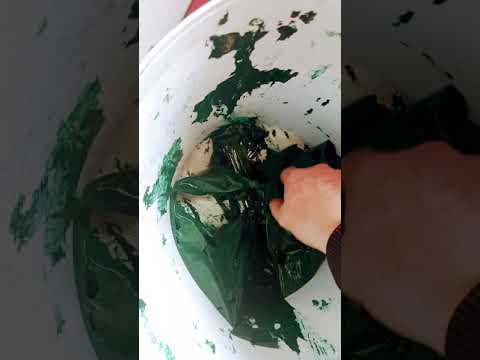 Cleaning Out A Paint Bucket.