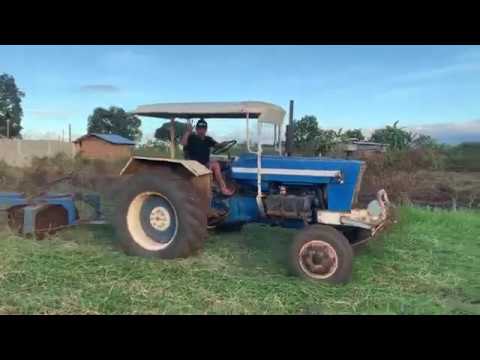 clearing land in Mindanao Phillipines 1,725 square meter lot farm vintage ford tractor