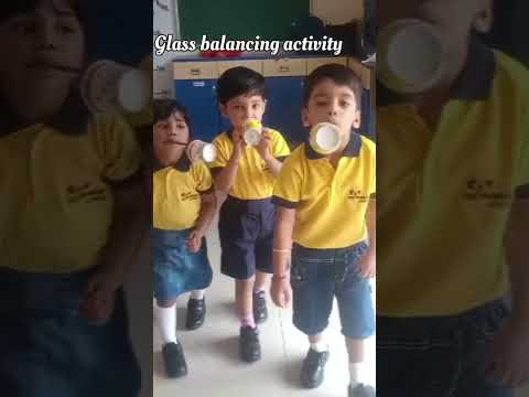 Glass balancing activity #kidseducatio #activity #school #schoollife #nurseryrhymes #lkg