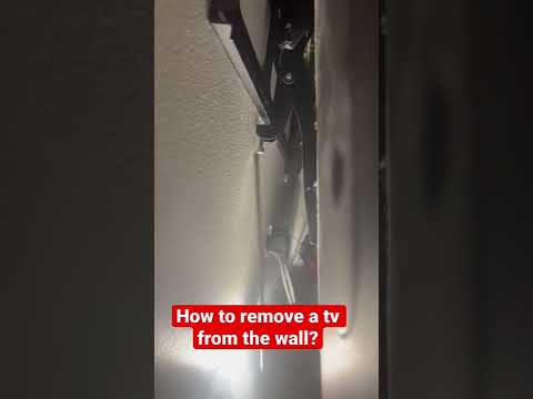 TV stuck to wall. How to remove tv from wall?
