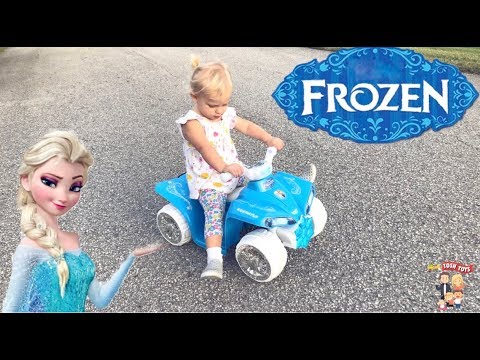Kids play with Frozen Power Wheel and Dune Racer Power Wheel Outdoors