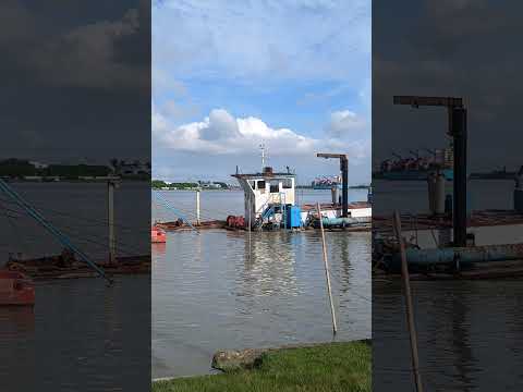 The dredger is sinking in the water