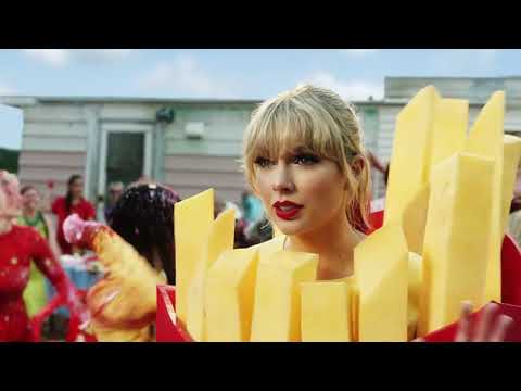 Katy Perry and Taylor Swift meeting each other but You Belong With Me is playing in the background