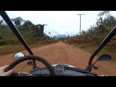 Laos - Driving a buggy on dirt road in Vang Vieng