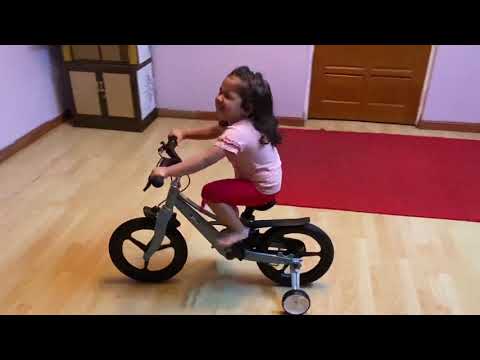 2.5 year old Ranita riding bike for the first time