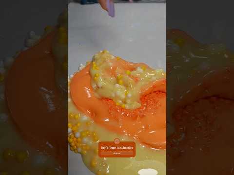 Orange slime with banana 🍌🍊 #slimeslime #slimevideos #slimeasmr #shorts #asmr #satisfying #slime