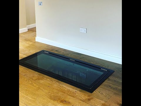 DioMet Electric Automated Hinged Glass Floor / Wine Cellar Door System.