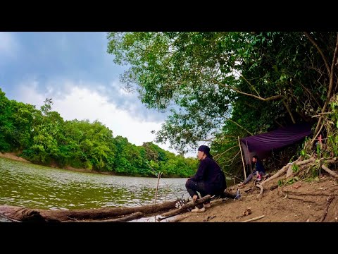 The fishing camp on the edge of a large river was hit by heavy rain when it opened a new spot