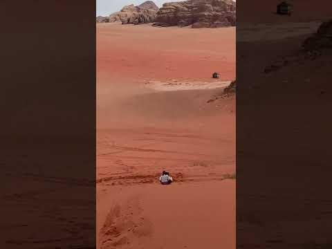 Like a pro 💁🏽‍♀️⛷️ #sandboarding #jordan #wadirum #desert #travelshorts #travelgirl #shorts