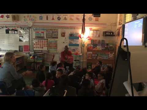 Robin Brown, CMS Community Partnerships, Reads to Montclaire Elementary students