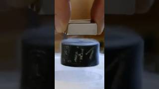 Superconducting Levitation Demo: the magnetic flux from the magnet is frozen inside the bulk YBCO