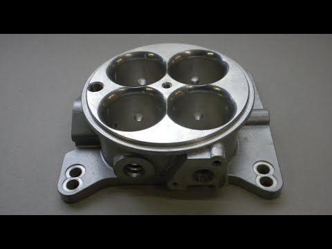 Casting a four barrel throttle body Part 3:-  Spraying the die and making the castings.