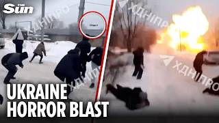 Horror moment Ukrainians run for their lives as Russian drone strikes just METRES away