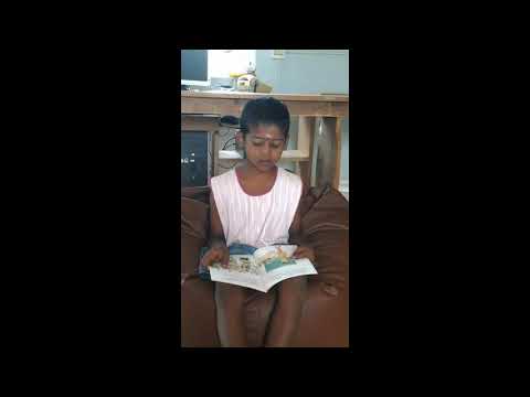 Grade 2 child reading a book