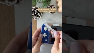 Apply the screen protector before you apply the switch lite skin