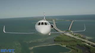 Dassault Falcon 900LX large cabin business trijet in flight