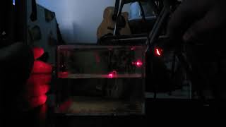 Laser refraction and reflection