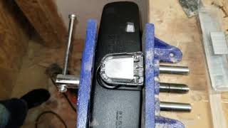 Removing rearview mirror mounting button