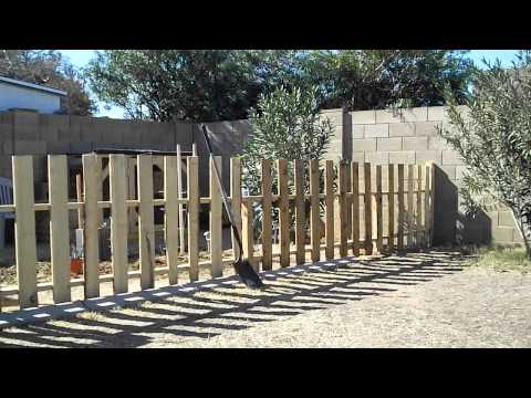 How to Build a Garden Fence using Reclaimed Pallets