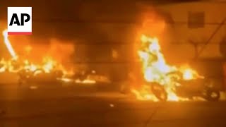Iran TV shows video of street fires in Tehran during protests