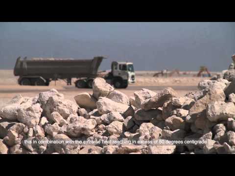 Hitachi EX1900-6 at the New Doha Port - Overview (English)