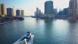 Amazing Aerial Footage in Dubai of a Drone Following a Speedboat