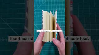 Hand-marbled paper 🤝 Handmade book // Marbled paper #marbledpaper #bookartist #bookbinding #booklove