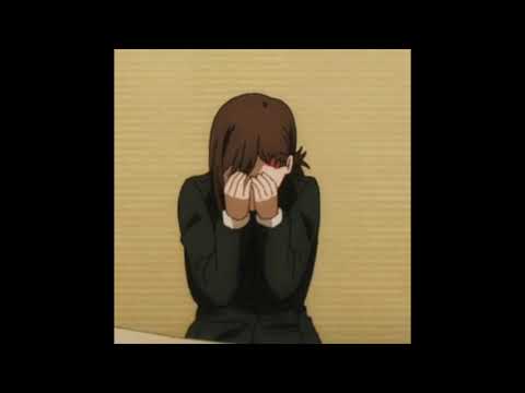 Still image of kobeni crying with Kendrick in the background
