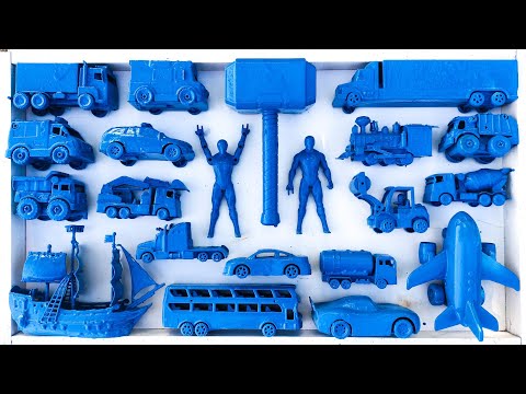 cleaning toy racing cars, dump trucks, trains, forklifts, planes, garbage trucks, loaders