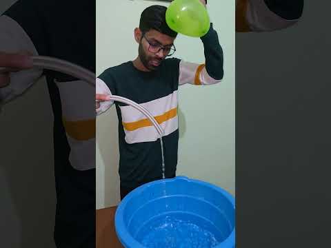 Science experiment BALLON attracted water #science #sciencefacts #viralvideo #viralshorts #trending