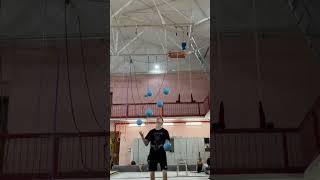 Impressive Juggling Act as Circus Artist Handles 5 Big Bounce Balls