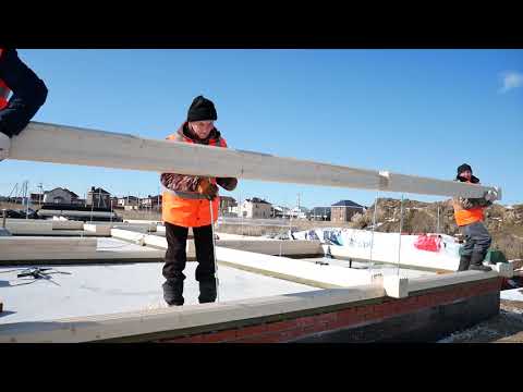 We built a house out of glued timbers. Step by step construction process
