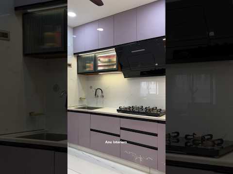 "Sleek lines, stylish finishes, and cutting-edge appliances define this modern kitchen"