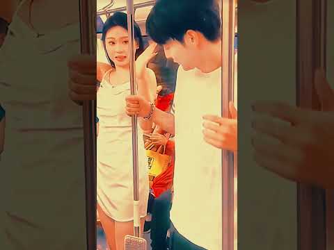 Awkward moment on the train! 😂 Girl accidentally grabs guy's handle. 🤣