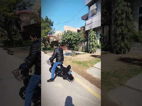 "Huaguan EV 'Lazer' Bike: Ride the Future with Dual Power!"
