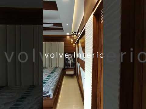 Bedroom Designed by Evolve Interio #panelling #3dpvc #laminates #woodenarchitecture #interiordesign