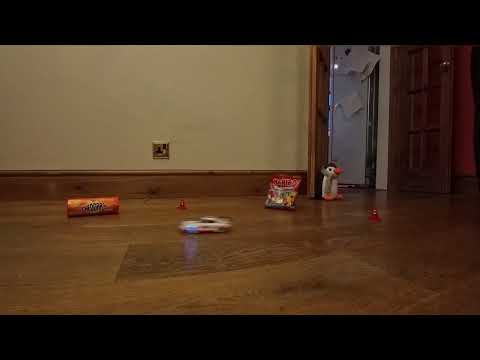 1/43 RC Car racing round the circuit of snacks and drinks
