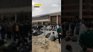 Bodies line the streets outside morgue in Tehran as protests continue